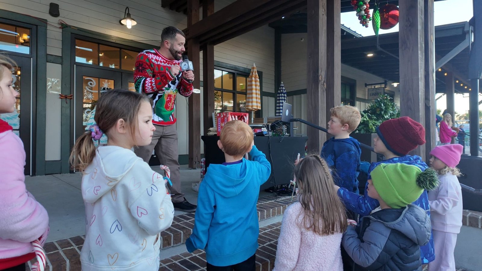 Holiday event host with kids